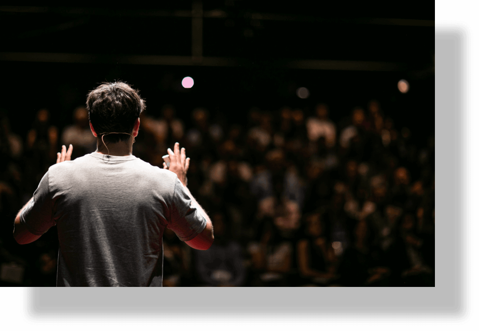 Speaker delivering a seminar to a crowd.